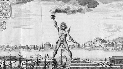 The Colossus of Rhodes is often depicted as straddling the harbor entrance, but this would have been technically impossible. The statue of the sun god Helios instead stood upright next to the harbor. Seven Wonders of the World.