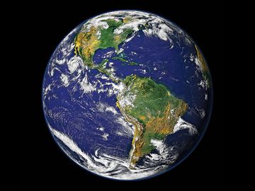 Digital image of the Western Hemisphere (Earth, Blue Marble) at the time of one of the strongest hurricanes (Hurricane Linda) ever observed in the Eastern Pacific. Moon is an artistic addition. (Data date: 2000)