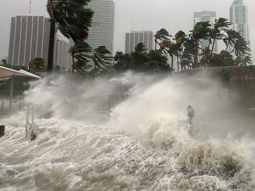 Hurricane Irma seen striking Miami, Florida with 100+ mph winds and destructive storm surge.