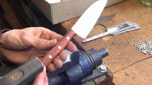 See how sharp kitchen knives are manufactured industrially by a company in Solingen, Germany