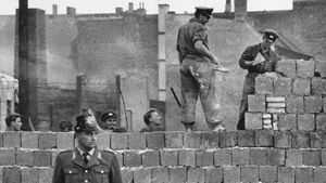 Examine the building of the Berlin Wall, which closed off access to West Berlin from East Berlin and East Germany