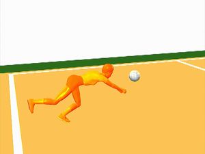 Observe the athletic coordination and flexibility required of a volleyball player to perform a defensive dig
