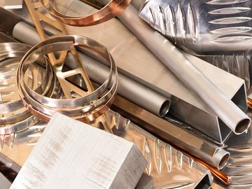Products from aluminum, copper, bronze, and brass on a white background. (metals)