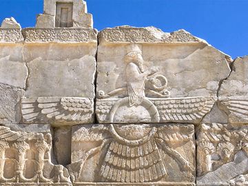 Ahura Mazda - relief of the Zoroastrian god Ahura Mazda at the ancient ruins of Persepolis in Iran. Also known as Ormazd Zoroastrianism,